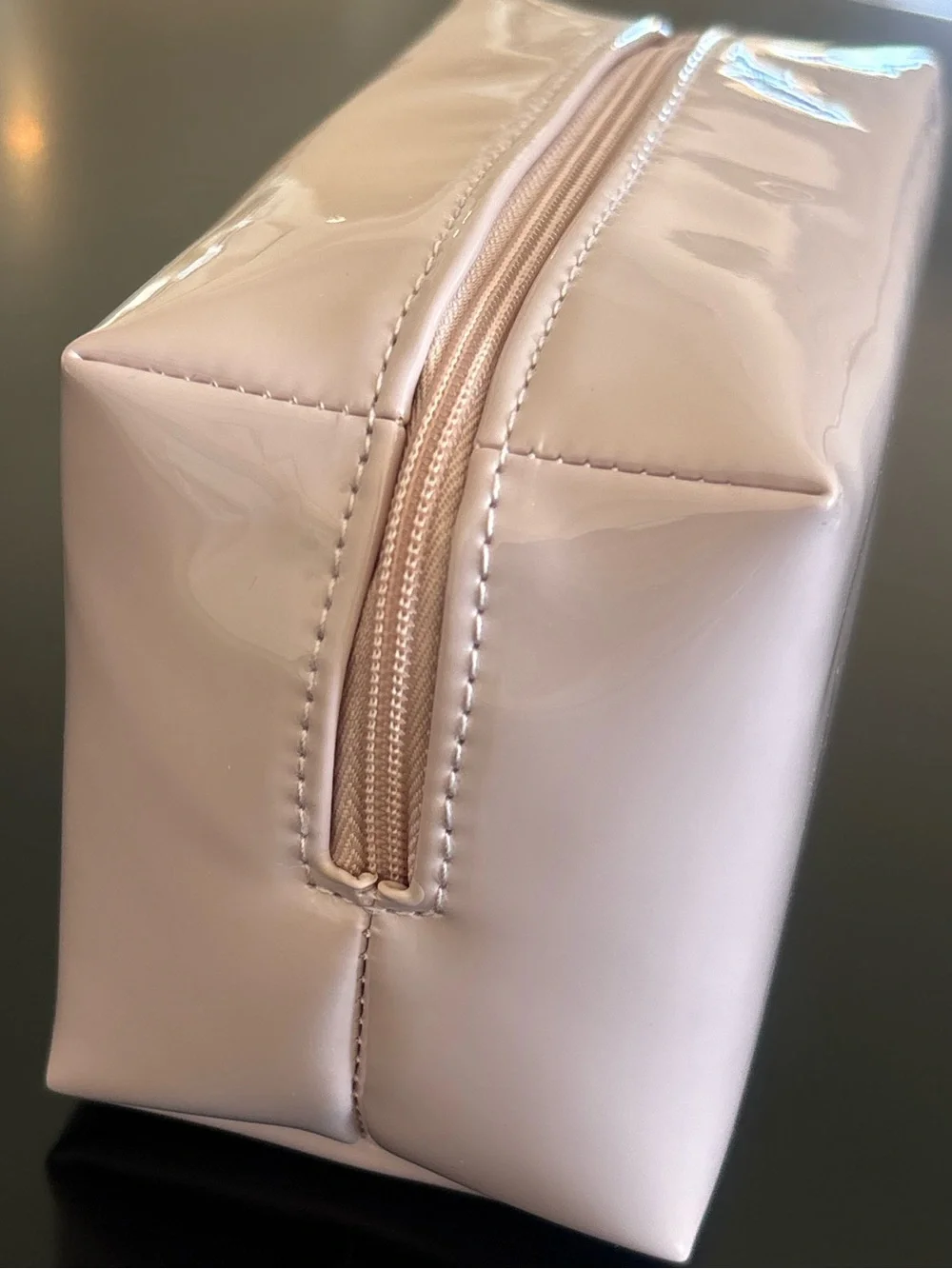 Dior beauty light pink glossy cosmetic bag with embossed CD logo